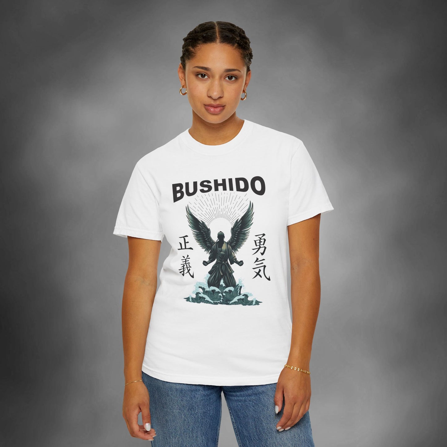 Woman wearing a white, cotton t-shirt with an illustration of a martial artist with angel wings. The text above the design reads "Bushido", and the kanji on the left and right sides are translated to English as "Justice" and "Courage".