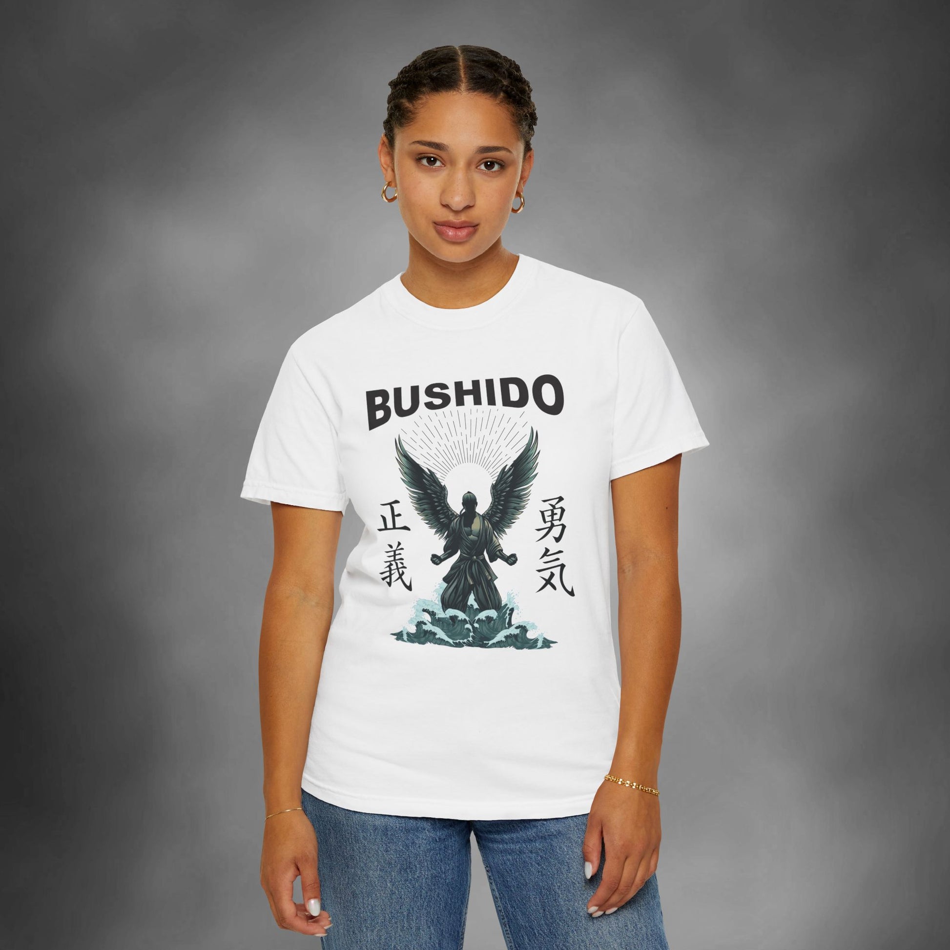 Woman wearing a white, cotton t-shirt with an illustration of a martial artist with angel wings. The text above the design reads "Bushido", and the kanji on the left and right sides are translated to English as "Justice" and "Courage".