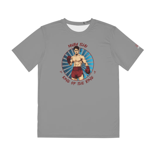 Light gray polyester t-shirt with an illustration of a Thai boxer in the center of the chest. Written around the illustration is the text, "Muay Thai - King of the Ring".