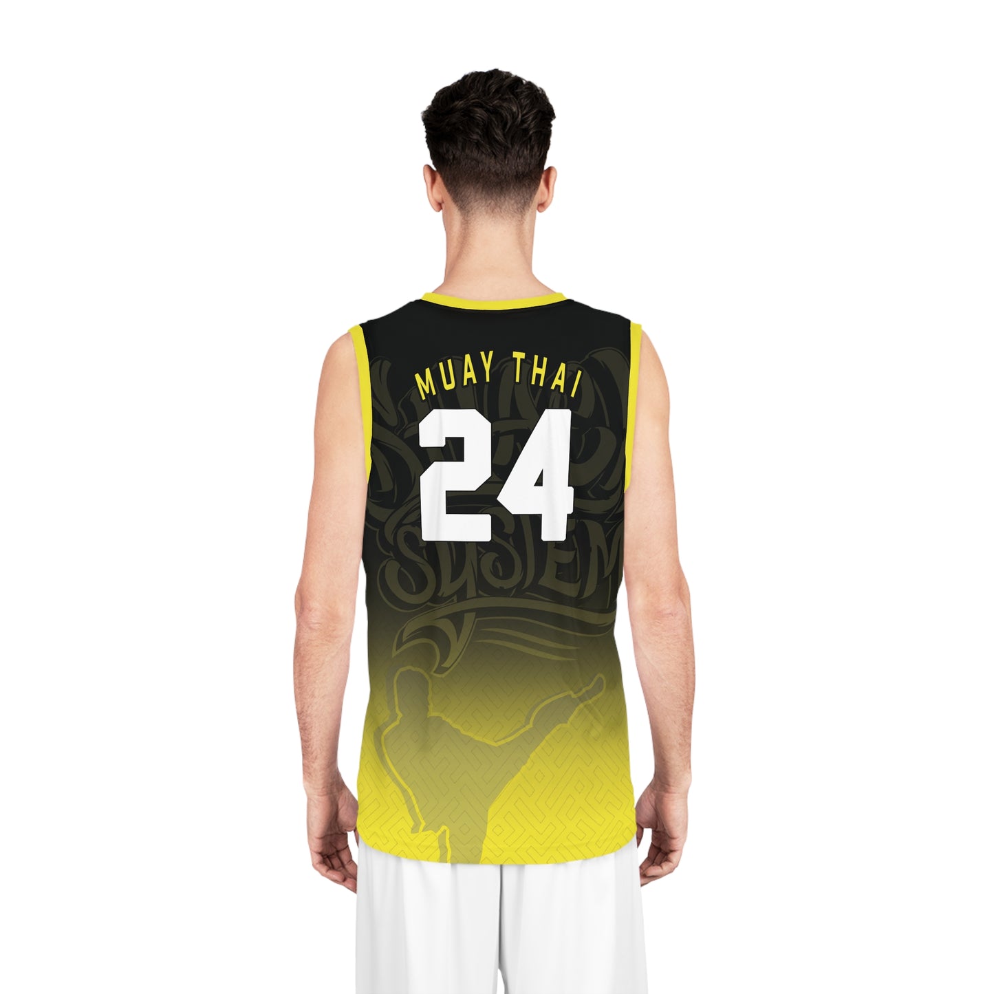 Back view of a man wearing a yellow and black jersey featuring The Shack System logo in the background and the text, "Muay Thai" and the number 24 printed on the upper back area.