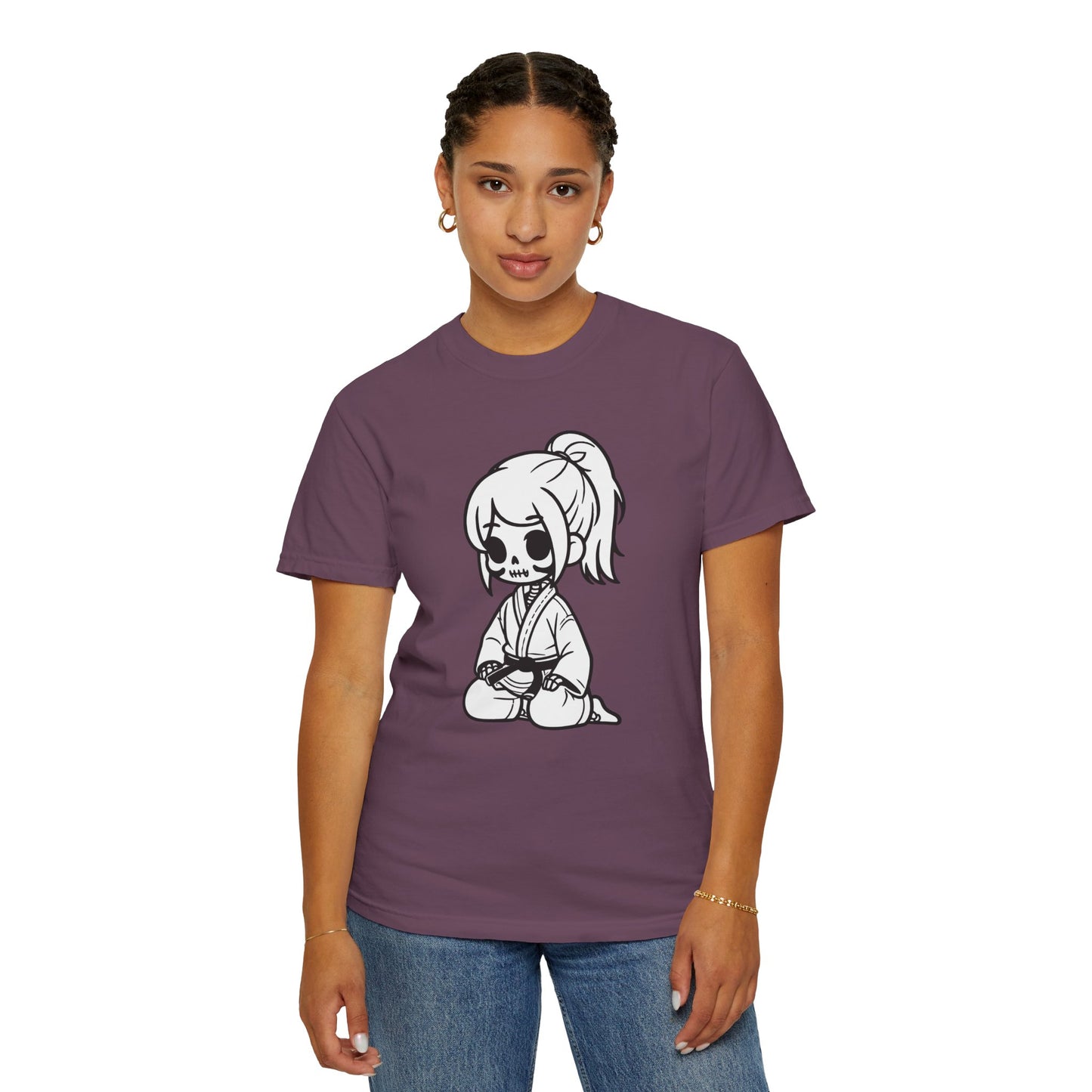 Front view of a woman wearing a Berry colored cotton t-shirt, with a design of a skeleton girl wearing a jiu jitsu gi printed on the front of the shirt.