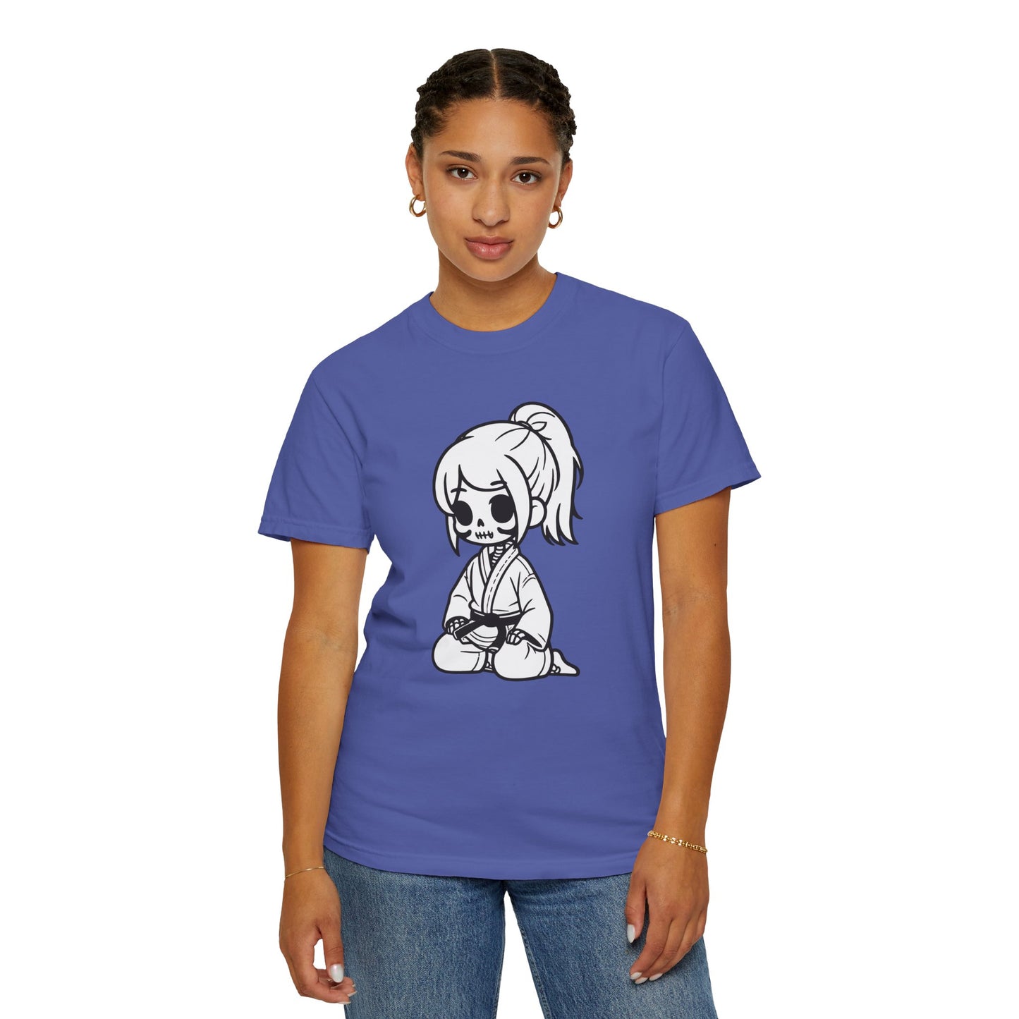 Front view of a woman wearing a Periwinkle colored cotton t-shirt, with a design of a skeleton girl wearing a jiu jitsu gi printed on the front of the shirt.