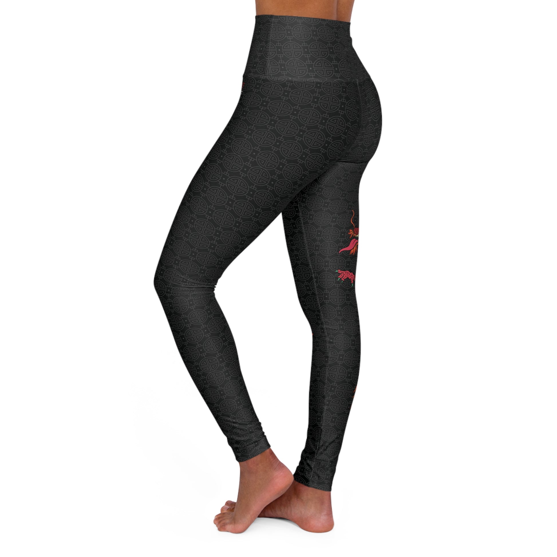 Left side view of black, patterned yoga leggings.