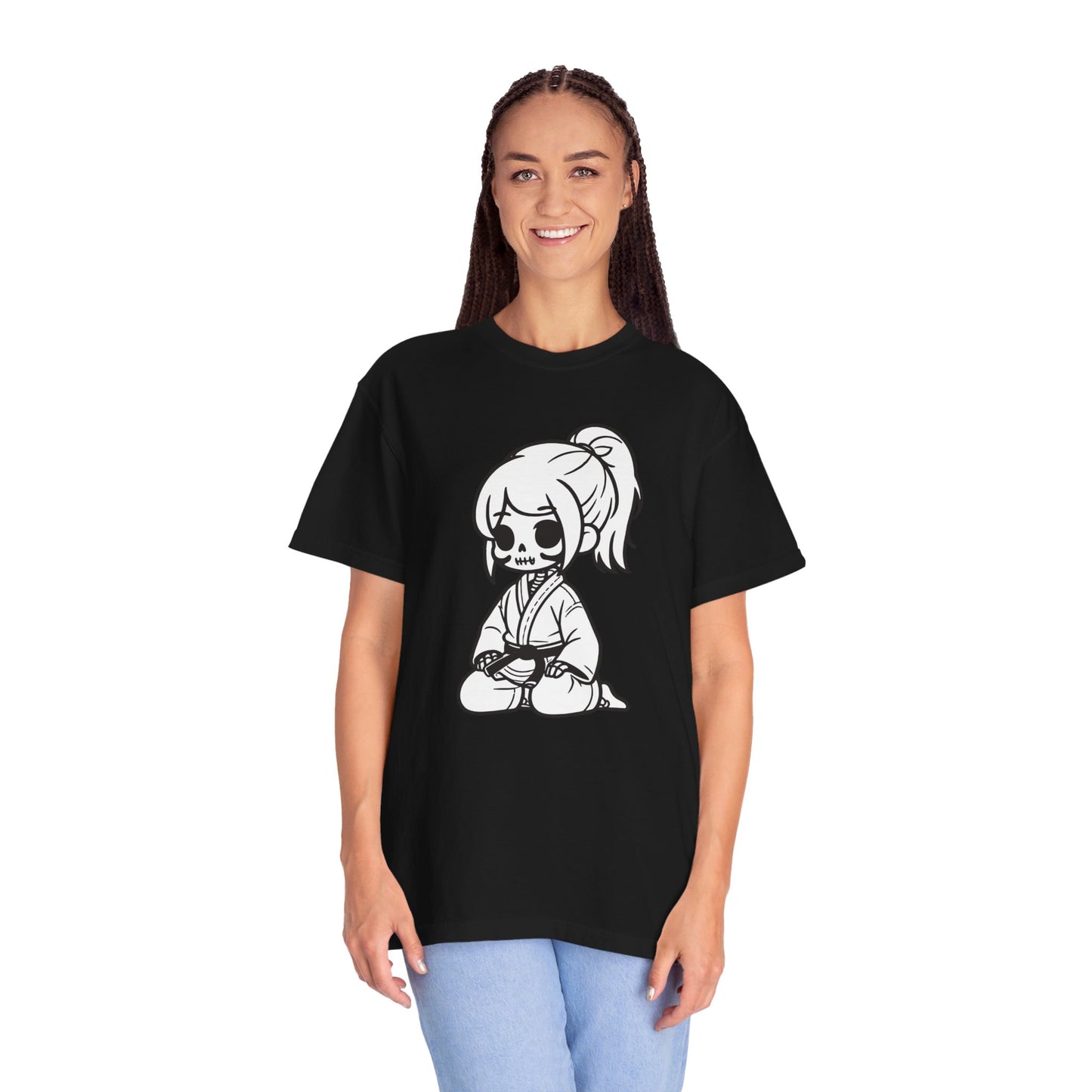 Front view of a tall, thin woman wearing a black cotton t-shirt, with a design of a skeleton girl wearing a jiu jitsu gi printed on the front of the shirt.