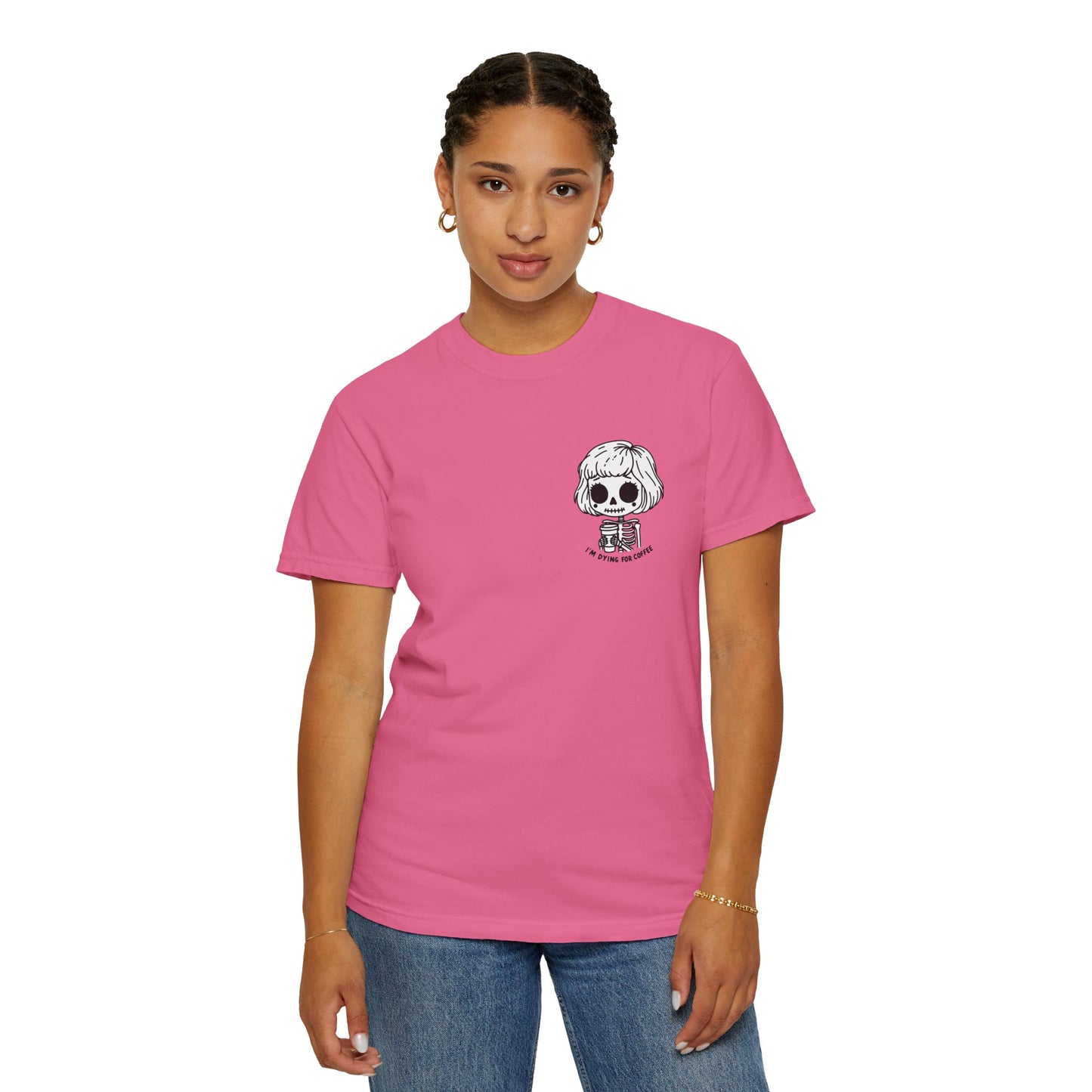 Alternate view of a woman wearing a Crunchberry colored t-shirt with a design of a skeleton girl holding a cup of coffee printed on the front. Written underneath the design is the text, "I'm dying for coffee". The design is placed on the left chest area of the t-shirt.