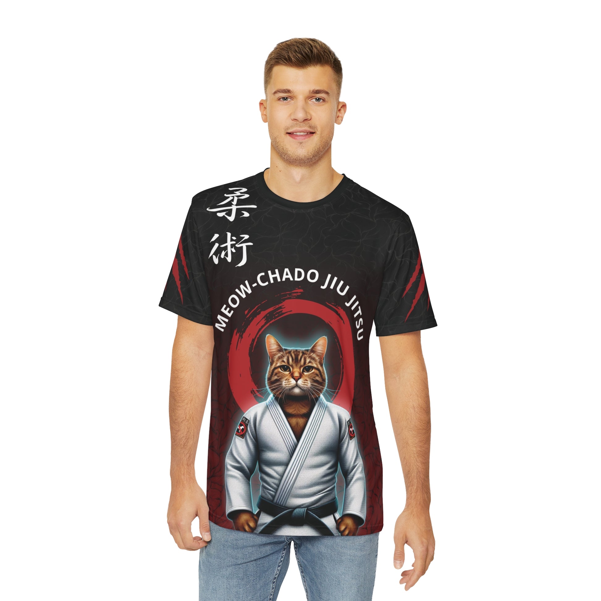 Man wearing a black and red polyester, all over print t-shirt, with an illustration of a cat wearing a Jiu Jitsu gi and black belt. Written above the cat is the text "Meow-Chado Jiu Jitsu". The sleeves of the shirt have claw marks across them.