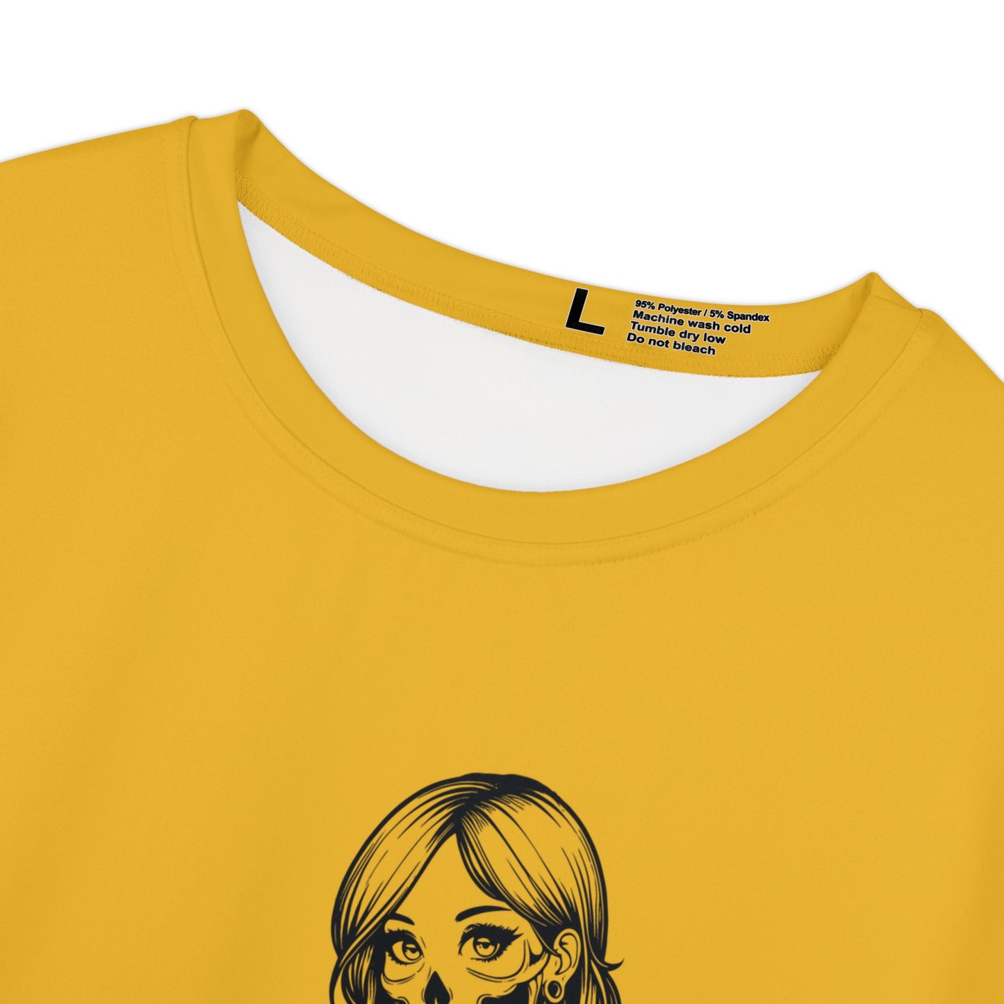 Close up view of the crew neck and care instructions of a yellow, polyester blend women's t-shirt.