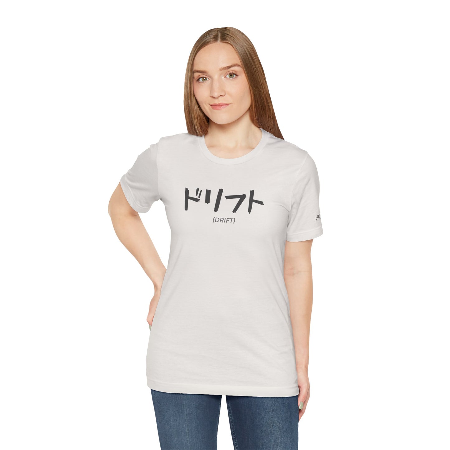 Alternate front view of a woman wearing an off-white t-shirt with text printed on the chest that spells Drift in Japanese.