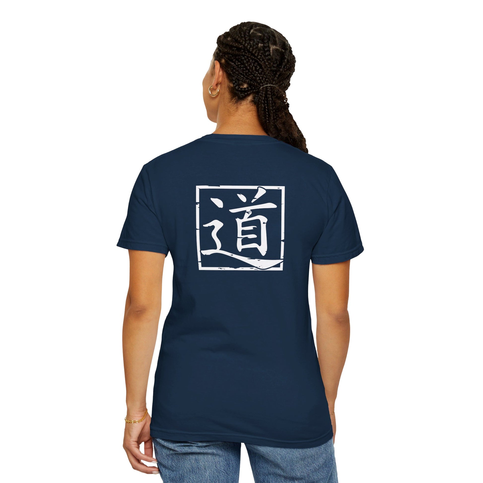 Back view of a woman wearing a navy blue t-shirt with the character for Tao placed in the upper back area.