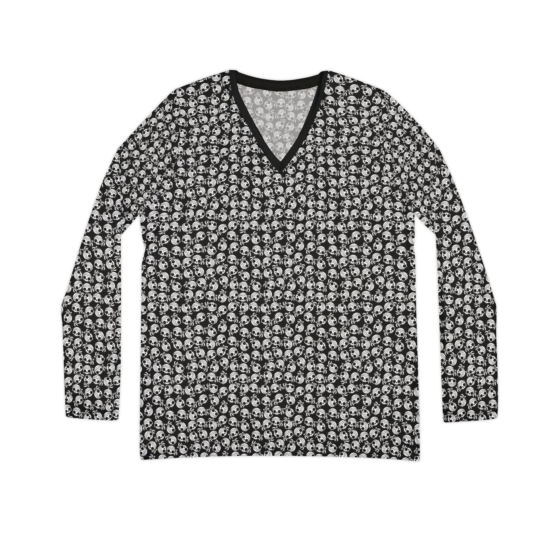 Front view of a skull-patterned, polyester blend, long sleeve Women's v-neck shirt.