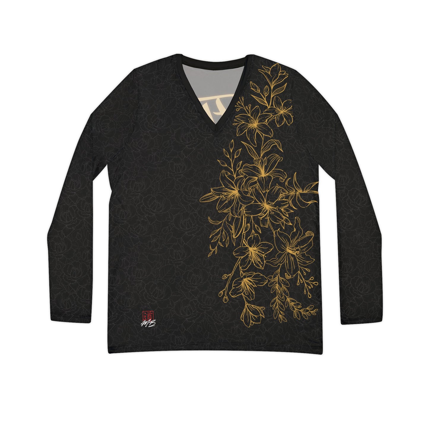 Front view of a black, patterned long sleeve v-neck shirt with a gold, floral print covering the left size of the shirt.