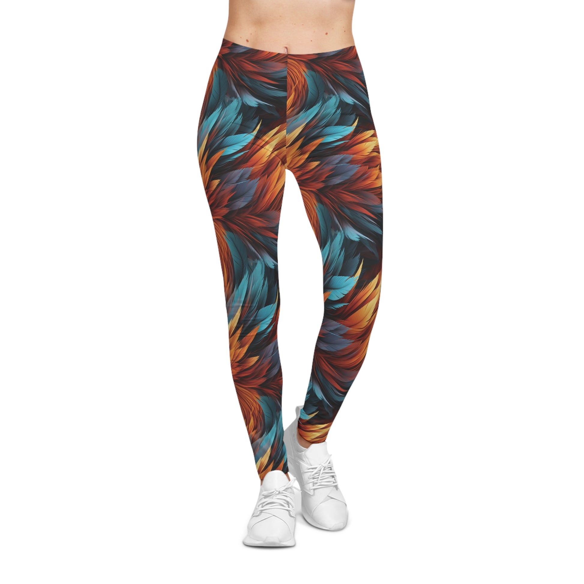 Front view of a woman wearing aqua and orange colored, feather print low rise leggings.