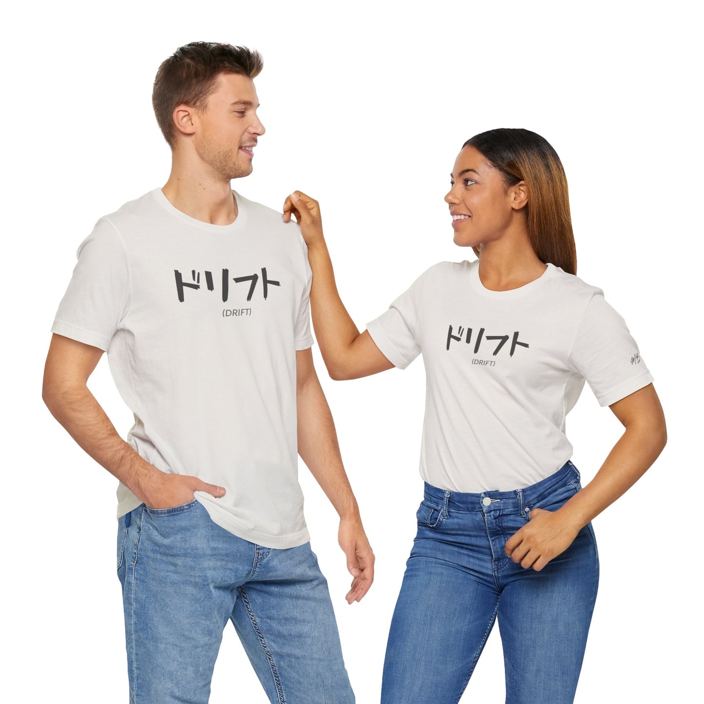 A man and woman wearing off-white t-shirts with text printed on the chest that spells Drift in Japanese.