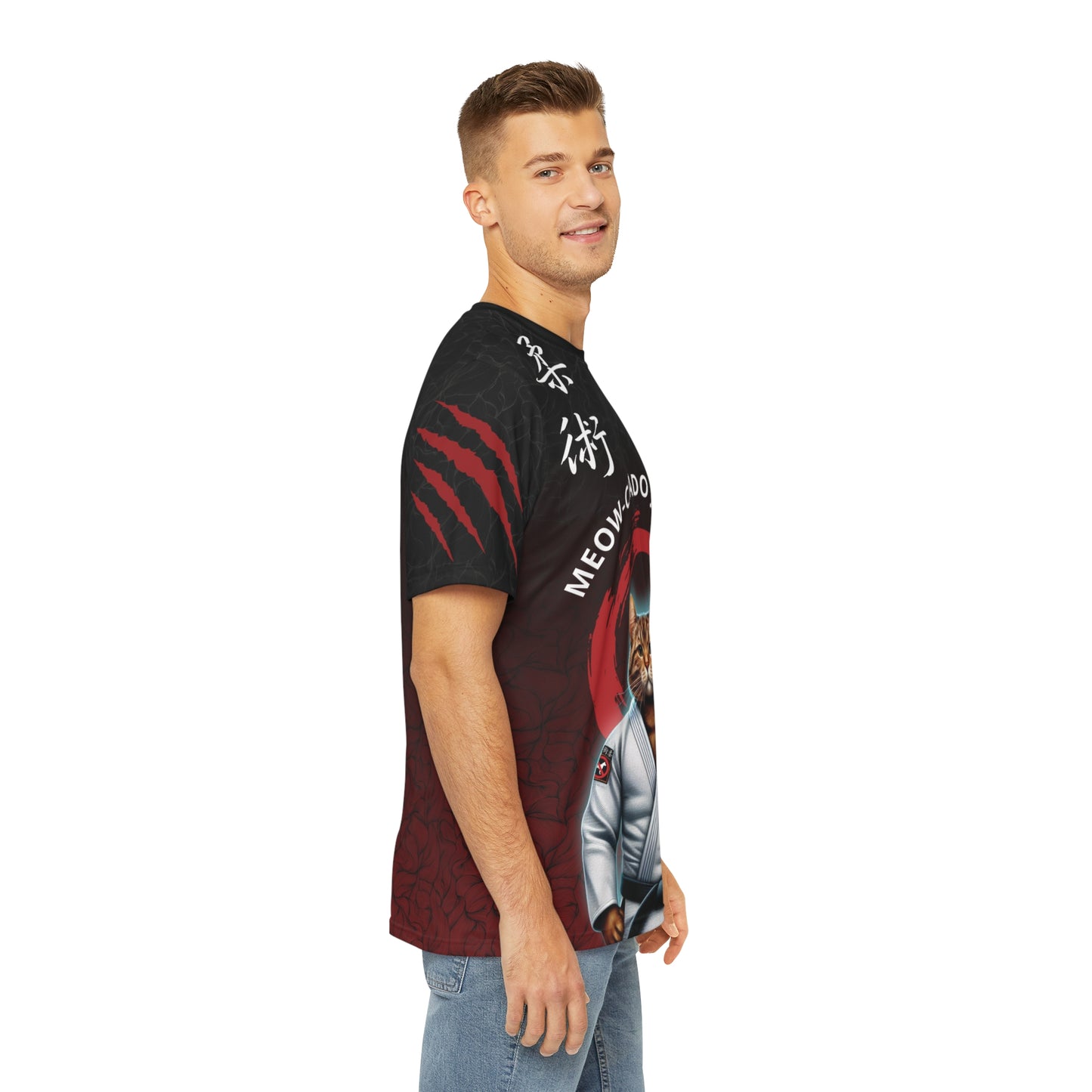 Right side view of a man wearing a black and red polyester, all over print t-shirt, with an illustration of a cat wearing a Jiu Jitsu gi and black belt on the front.