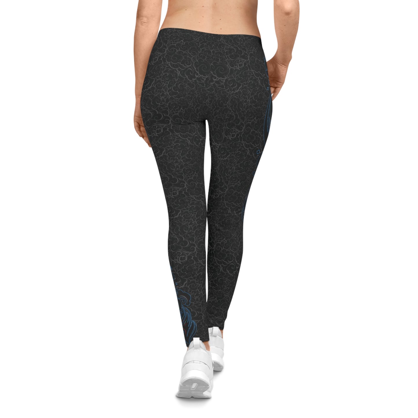 Back view of black, patterned low-rise leggings.