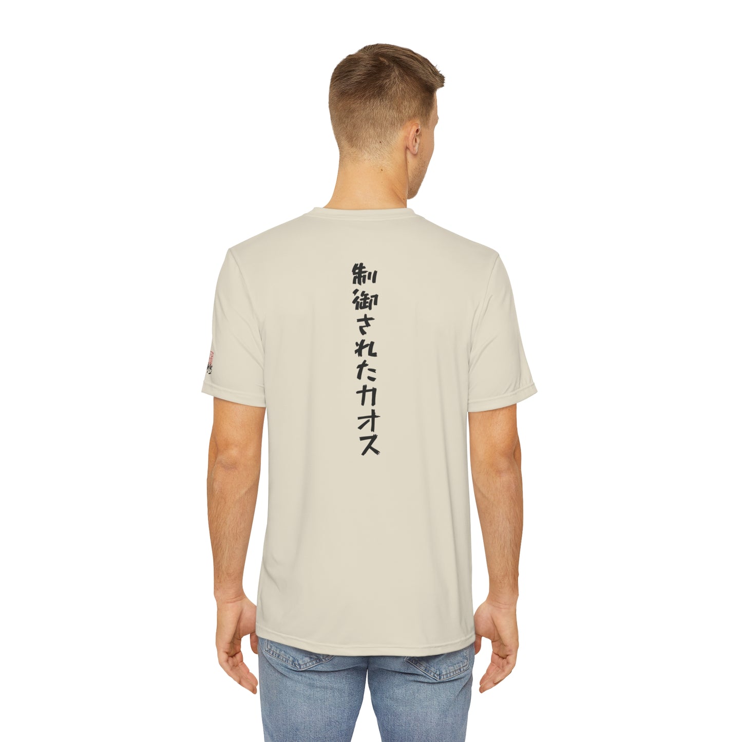 Back view of a man wearing an off-white t-shirt, with the words "Controlled Chaos" written vertically down the middle of the shirt in Japanese.