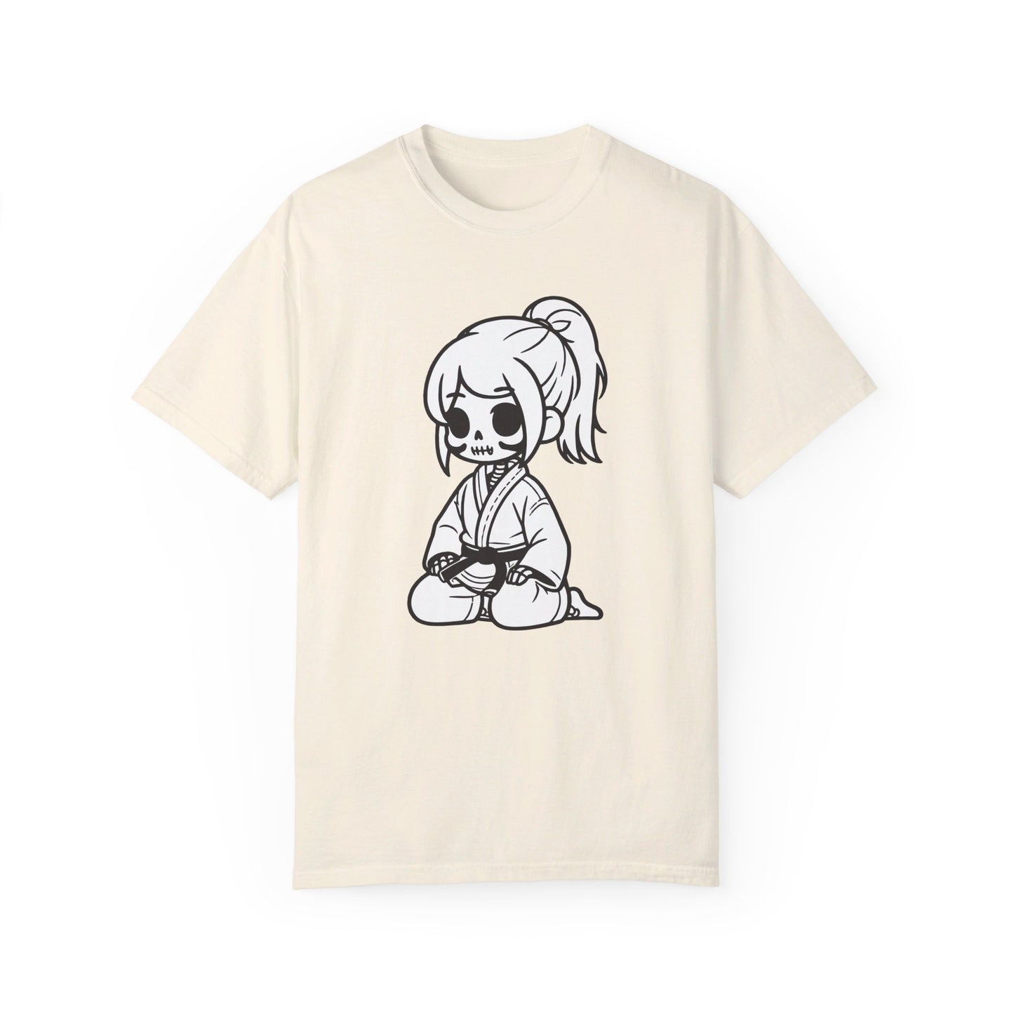 Front view of an ivory colored, cotton t-shirt with a design of a skeleton girl wearing a jiu jitsu gi. Wrapped around the girl's waist is a black belt.