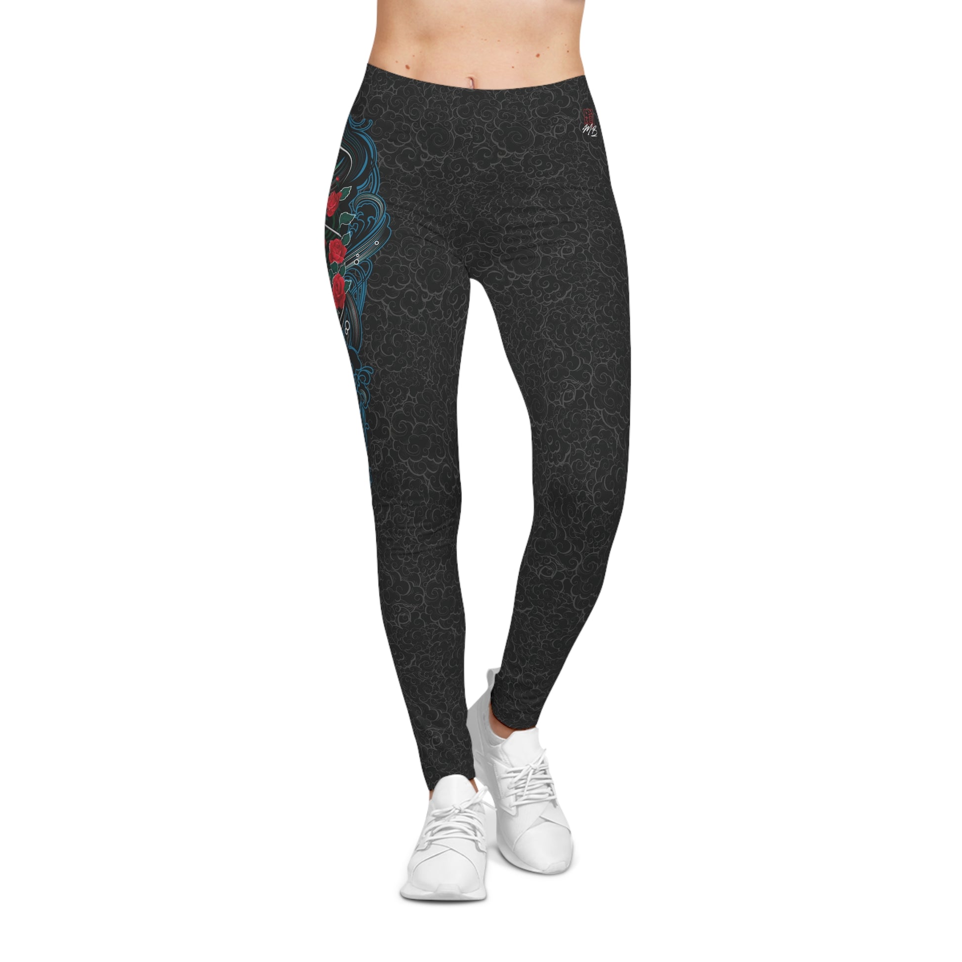 Front view of black, low-rise casual leggings with a light background pattern. Printed on the right, upper hip area is an illustration of a female warrior holding a katana sword.