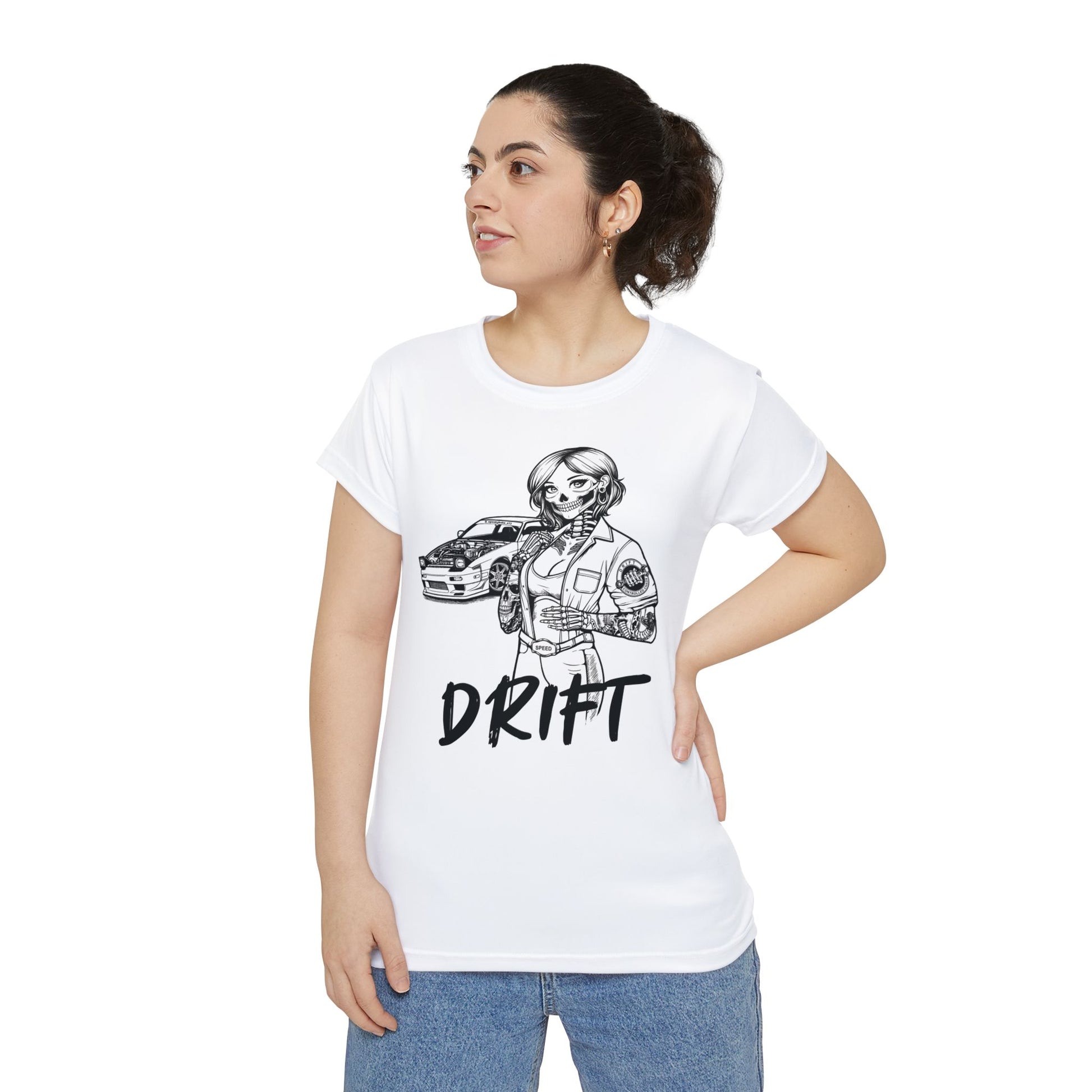 Front view of a woman wearing a white, polyester blend t-shirt, with a design of a female skeleton dressed as a mechanic. The mechanic is standing next to her car with the word "Drift" written underneath.