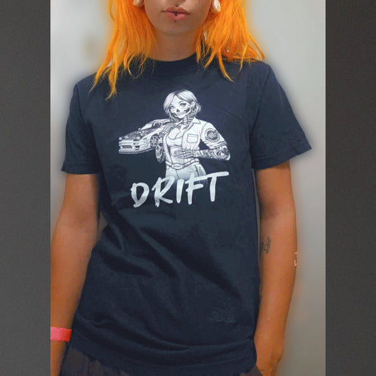 Woman wearing a black cotton t-shirt with a design of a female skeleton dressed as a mechanic. The mechanic is standing next to her car with the word "Drift" written underneath.